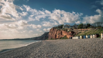 Budleigh Salterton pebble beach and red cliffs on the Jurassic Coast in East Devon