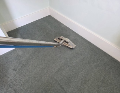 Professional carpet cleaning in Exeter using hot water extraction equipment