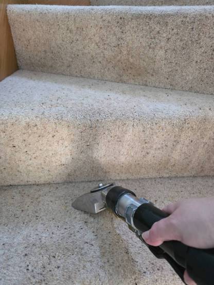 Professional stair carpet cleaning in Exeter removing heavy dirt
