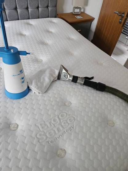 Professional mattress cleaning in Doddiscombsleigh Exeter showing stain treatment and extraction process