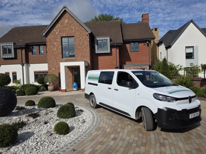 Madterclean technicians and service vehicle outside customers home in Mountbatten Drive Exeter